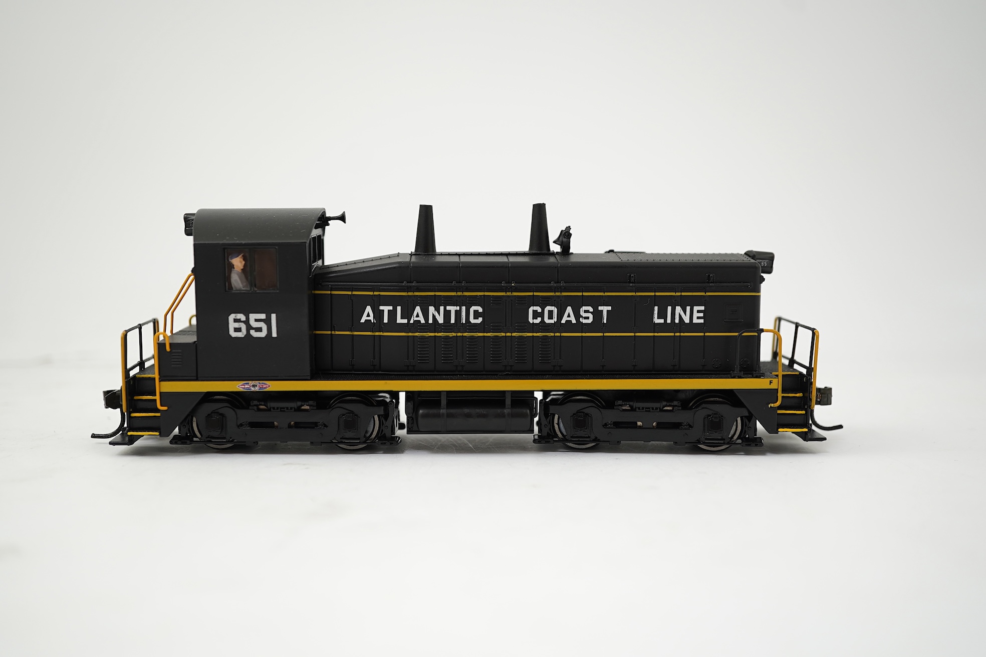 A boxed HO gauge Broadway Limited Paragon 2 Series (1215) model of Atlantic Coast Line, EMD SW7 Switcher PHII, 651, Bo-Bo diesel locomotive, powered for two rail operation.